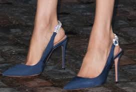 Meghan herself has beeen seen in numerous different shoe styles by the label since becoming a royal, even wearing a bespoke pair of heels by the brand for her wedding reception in. Meghan Markle S Blue Dress By Jason Wu Has Sparkling Flirty Heels Evesham Nj News