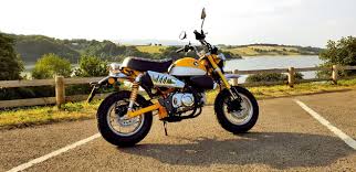 Honda Monkey 125 Specification Iconic Styling With Modern Touches Upside Down Forks Lcd Instruments And Led Lighting Honda Logo Honda S Wings Design