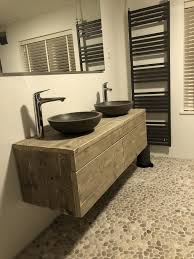 pebbles bathroom steigerhout natuursteen waskom badkamer badkamer inrichting badkamer inspiratie