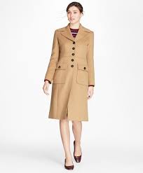 There are many colors running through the tan plaid with a vertical burnt orange lines as well as horizontal red lines. Petite Camel Hair Polo Coat Brooks Brothers