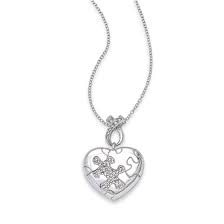 Don't wait, get yours today! Heart Shaped Autism Puzzle Piece Locket Sterling Silver Long Island Jewelers Fortunoff Fine Jewelry