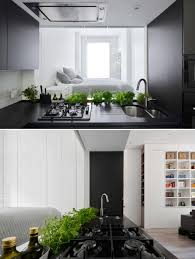 Glass backsplash ideas are perfect for accentuating modern kitchen design with contemporary or rustic elements, enhancing kitchen interiors with textures, shine and beauty. A Glass Backsplash In The Kitchen Lets Light Pass Through This Small Apartment