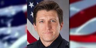 Officer killed in crash while responding to call with emergency lights on,  officials say