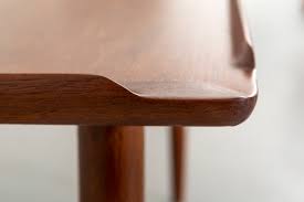 The entire table has been beautifully wrapped with mirror work on the tabletop as well as legs. Poul Jensen For Selig Coffee Table Matthew Rachman Gallery