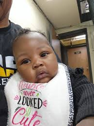 Look who coach E has at the gym. She was cranky at first, but now we  besties. That's my lil cousin.