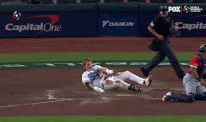 Italy's Sam Antonacci hits bases clearing triple and scores on throwing error, extending lead over Great Britain