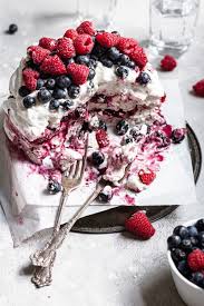 Berry Pavlova Cake Is A Sweet And Creamy Dessert Recipe In 2020 Delicious Cake Recipes Yummy Food Dessert Pavlova