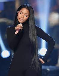 Minaj posted photos of herself sitting in front of a vanity mirror wearing a fishnet bikini with black pasties covering up her nipples. These Are The 10 Most Followed People On Instagram Nicki Minaj Hairstyles Nicki Minaj Pictures Nicki Minaj