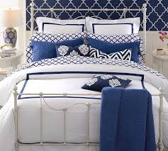 The solid design and the extravagant pattern make the bed look super luxurious. Morgan Banded 400 Thread Count Organic Percale Duvet Cover Pottery Barn
