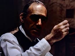 Salvatore "Sal" Tessio]...They've got an old-fashioned toilet. You know,the  box and the chain thing.We might be able to tape the gun behind it.