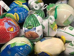 Frozen turkeys in grocery store. Get To Know Your Turkey And Its Farmer With The Jennie O Turkey Tracker