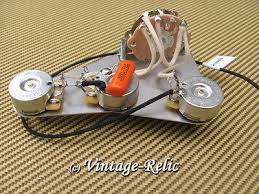 Below is the instructions for an vintage wiring to be installed in you strat style guitar. Upgrade Wiring Kit Pre Wired Fits Fender Stratocaster Orange Drop Cap Cts Pots Ebay