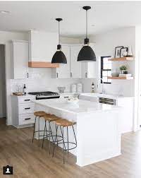 It's a perfect example of how dreamy a small space can become with thoughtful consideration of details. Small Kitchen W Island White Kitchen Design Kitchen Design Home Decor Kitchen