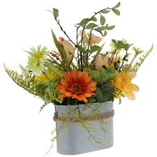 The flowers fully open up to face the sun, remain partially open during cloudy or rainy days and close at night. Orange Yellow Flower Arrangement Hobby Lobby 1220664