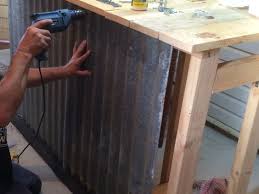 This is a larger project than the relatively small outdoor kitchen setup above. Contact Us For Corrugated Iron Sheet Sheet Metal Iron Sheets Ironsheet Sheetmetal Corrugatediron Corru Diy Outdoor Bar Outdoor Patio Bar Corrugated Metal