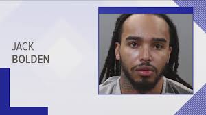 KPD: Man in custody after chasing after woman, hitting SUV