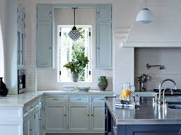 Almost any color coordinates with light oak cabinets as long as it doesn't. Painted Kitchen Cabinet Ideas Architectural Digest