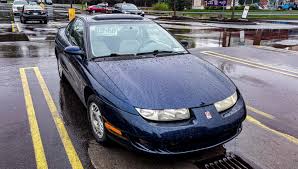 Image result for Bright Red 2000 Saturn