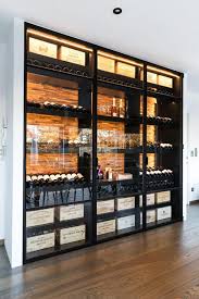 Glass Wine Cellar In Kitchen Glass Wine Cellar In 2020 Home Wine Cellars Glass Wine Cellar Wine Cellar Wall