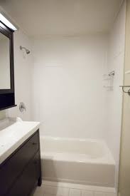 The general recommendation i'm reading/being told at stores is that i can just glue it to drywall (greenboard), but i thought that greenboard is not recommended for wet areas. Tubcove Seattle Laminate Seamless Bath Tub Wall Surrounds