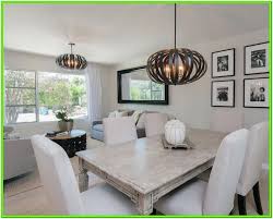 The right light can make or break the look of a room — especially when it comes to the space where you share your meals. Chandelier Living Room Lighting Ideas Living Room Lighting Chandelier In Living Room Living Dining Room