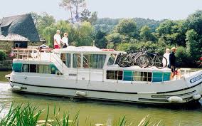 Pénichette® flying bridge 1500fb en location à lattes pour découvrir la camargue annulation ou modification flexible péniche pénichette flying bridge 1500 fb 14,90 m Penichette 1165 Fb Canal Boating In France En Europe