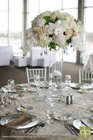 Tall Lush Floral Centerpiece With Hanging Crystals White Flower Centerpieces Flower Centerpieces Wedding Table Centerpieces