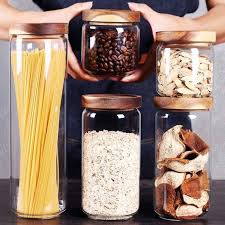 This mason jar canister set is perfect for your kitchen, and can be customized to your own kitchen decor. Glass Storage Jar With Wood Lid Eco Glass Jar Pantry Jar Food Etsy In 2021 Food Jar Spice Jars Flour Container