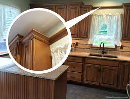 Flex the moulding in place. How To Install Crown Molding Or Valance Board Around A Cabinet Home Improvement Stack Exchange