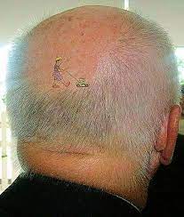 The Lawnmower Man Tattoo Of A Man Moving This Guy S Hair Funny Tattoos Clever Tattoos Bones Funny