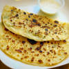 It consists of steamed rice mixed with raisins, carrots, and beef or lamb. 1