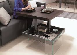 This coffee table features an adjustable height surface that provides the perfect height for you. High Adjustable Coffee Table Height