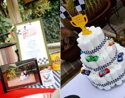 Car Themed Shower Party Menu And Diaper Cake Baby Shower Baby Shower Games Cars Theme