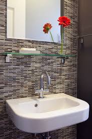 wall mounted sink w/ patterned tile