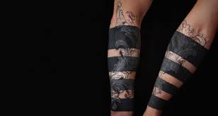 And over white he has red and green on him as well. Modern Markings 42 Bold Black White Tattoo Designs Urbanist