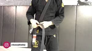 How to tie a jiu jitsu belt by professor parafuso kak zavyazyvat poyas v dzhiu dzhitsu. How To Tie Your Jiu Jitsu Belt Kenny Kim Brazilian Jiu Jitsu