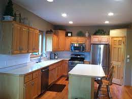 Before Photo Oak Cabinets With Brushed Nickel Hardware Stainless Faucet White Bathroom Tile Backsplash Oak Cabinets Update Kitchen Cabinets Grey Cabinets