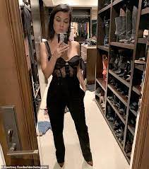 At the time, a source told tmz that the kardashian and west, who have four children together, were already far along in reaching a property settlement. Kourtney Kardashian Poses In A Black Lace Bustier To Kick Off The First Work Day In 2021 Daily Mail Online