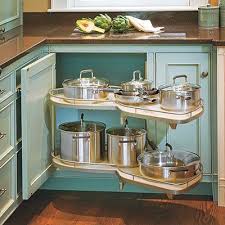 Turntables are the kitchen storage secret weapon when it comes to making any dead the surface underneath your cabinets can also be used to keep items organized and off of surfaces. Optimize Corner And Base Cabinets With Pull Out Or Rolling Shelves Kitchen Remodel Kitchen Design Kitchen Cabinets