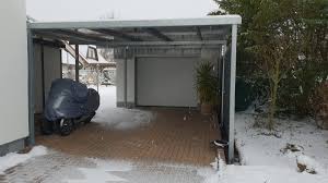 It has to be built in a low economy so everyone can afford it. Doppel Carport Aus Stahl Pultdach Vor Bestehende Garage News Brandl