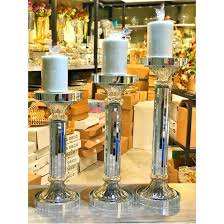 Şeffaf cam mumluk, doğa motifli seramik mumluk, cam şeritli mumluk, gümüş şeritli büyük ve küçük mumluk, dekoratif mumluklar, kristal. Uzun Ayakli Aynali Samdan Mumluk