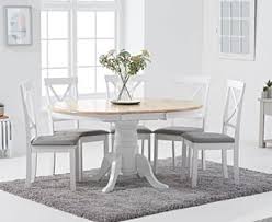 After sale price £1495 sale £1095. Epsom Oak And White Round Pedestal Extending Table With Epsom Chairs With Grey Fabric Seats