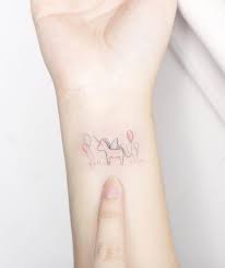 8 girls tattoos on wrist; 40 Beautiful Tiny Wrist Tattoos For Women Tattooblend