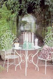 Garden Wedding Photoshoot Wrap It Up Pretty Enchanted Garden Wedding Wrought Iron Table Vintage Patio