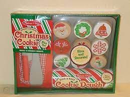 .doug christmas cookie set includes a tube of 12 sliceable cookies with 12 decorative toppings, an oven mitt, wooden cookie sheet, knife, and spatula. Melissa And Doug Christmas Cookies Wooden Slice Bake Playset 1469070614