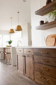 Gorgeous Brown Oak Shaker Cabinets Are Accented With Brass Pulls And A White Quartz Countertop Fixed B Brown Kitchen Cabinets Home Decor Kitchen Brown Kitchens
