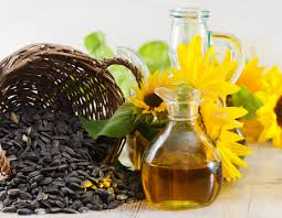 Queens Of Curls Natural Hair Care The Benefits Of Sunflower Oil On Hair Sunflower Oil Oils For Skin Cooking Oil