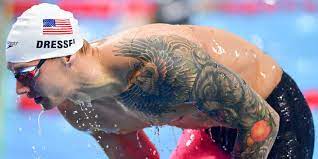 Caeleb dressel and his wife, meghan, look at a phone in the stands before the tyr pro swim series swim meet in mission viejo, calif credit: A Day In The Life Caeleb Dressel S Recipe For Success Includes Puppy Training Downtime And A Lot Of Food