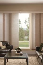 A modern solution for window treatments for sliding glass doors is sliding panel track blinds. Living Room Modern Glass Door Design Living Room New Design