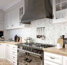 Tiled kitchen backsplashes give a custom look to a home and stand up better than a wallpapered backsplash according to an angie's list magazine report. How To Choose Kitchen Backsplash Tile Behind The Stove